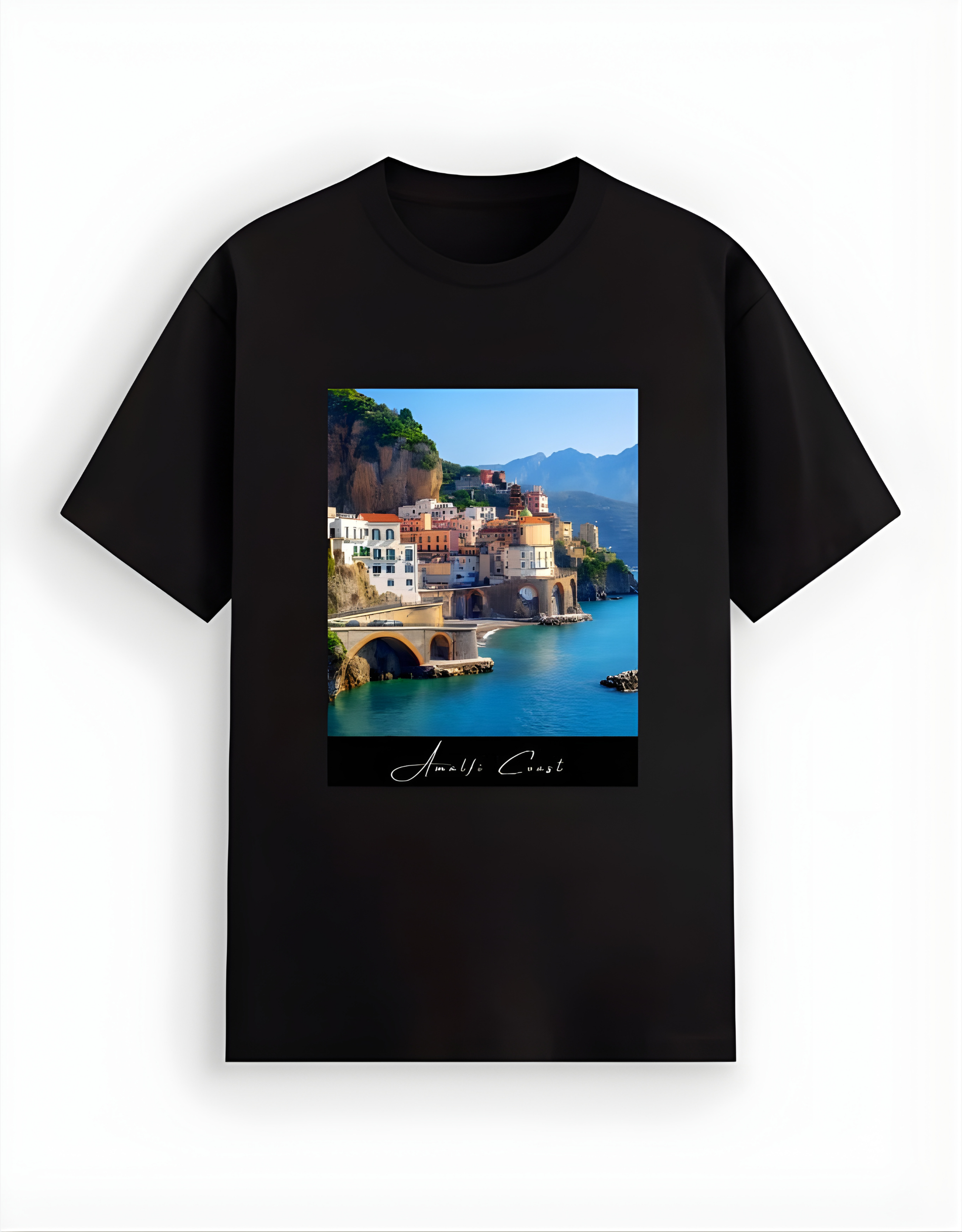 Black t-shirt with a scenic print of a coastal town on a white background