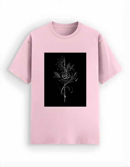 Pink t-shirt with a black square featuring a white floral design on a white background
